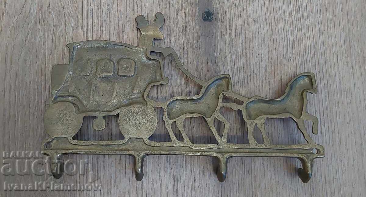 Delivery of Vintage brass coat hanger for collectors Delivery of Vintage brass coat hanger for collectors