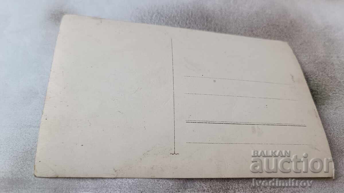 Photo Men on stairs in front of a monument with price 1.85 BGN | € 0.95