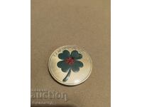 Copper lucky coin with clover for success and prosperity