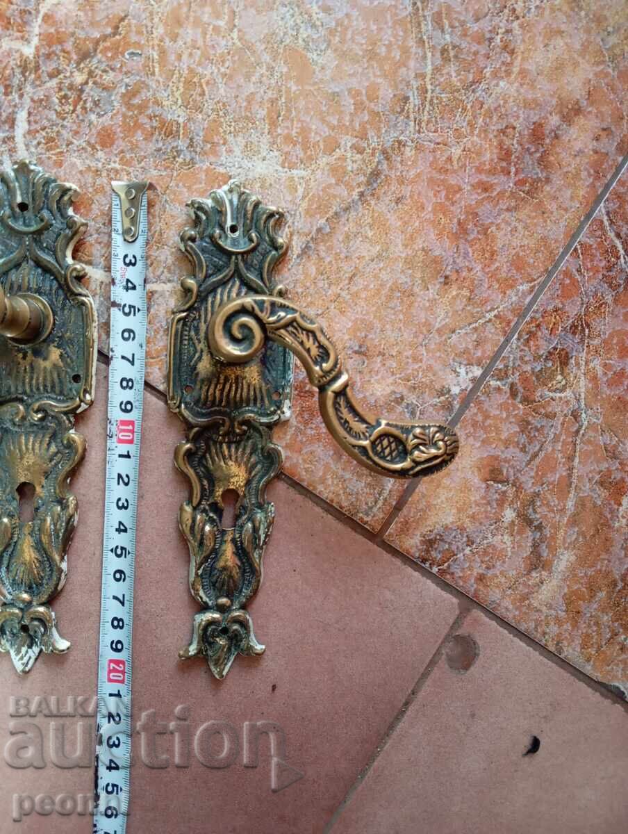 Auction Old bronze handles Auction Old bronze handles