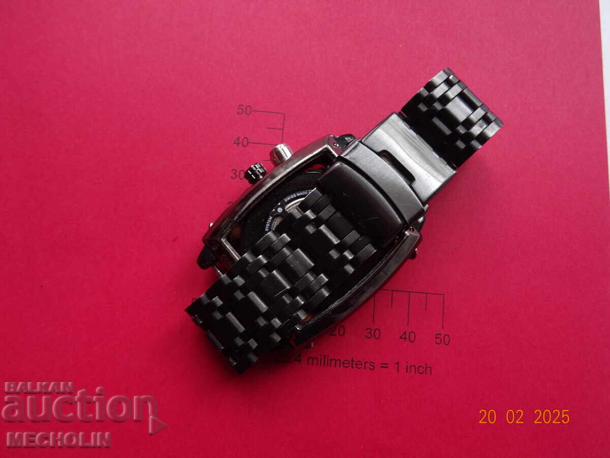 Delivery of COLLECTOR'S WATCH TAG Heuer MONACO AUTOMATIC Delivery of COLLECTOR'S WATCH TAG Heuer MONACO AUTOMATIC