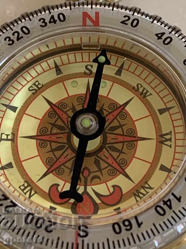 Auction  Stylish new compass in a brass case