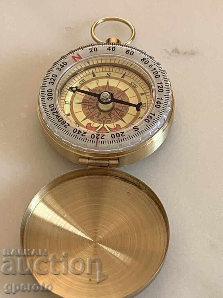 Stylish new compass in a brass case Stylish new compass in a brass case