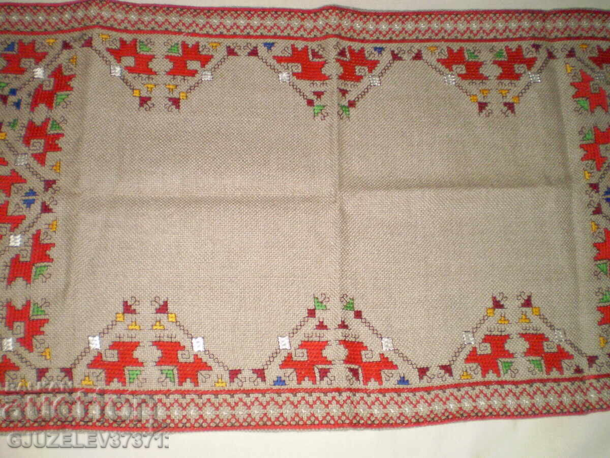 Delivery of Hand embroidered checkered twill on linen panama cotton brod
