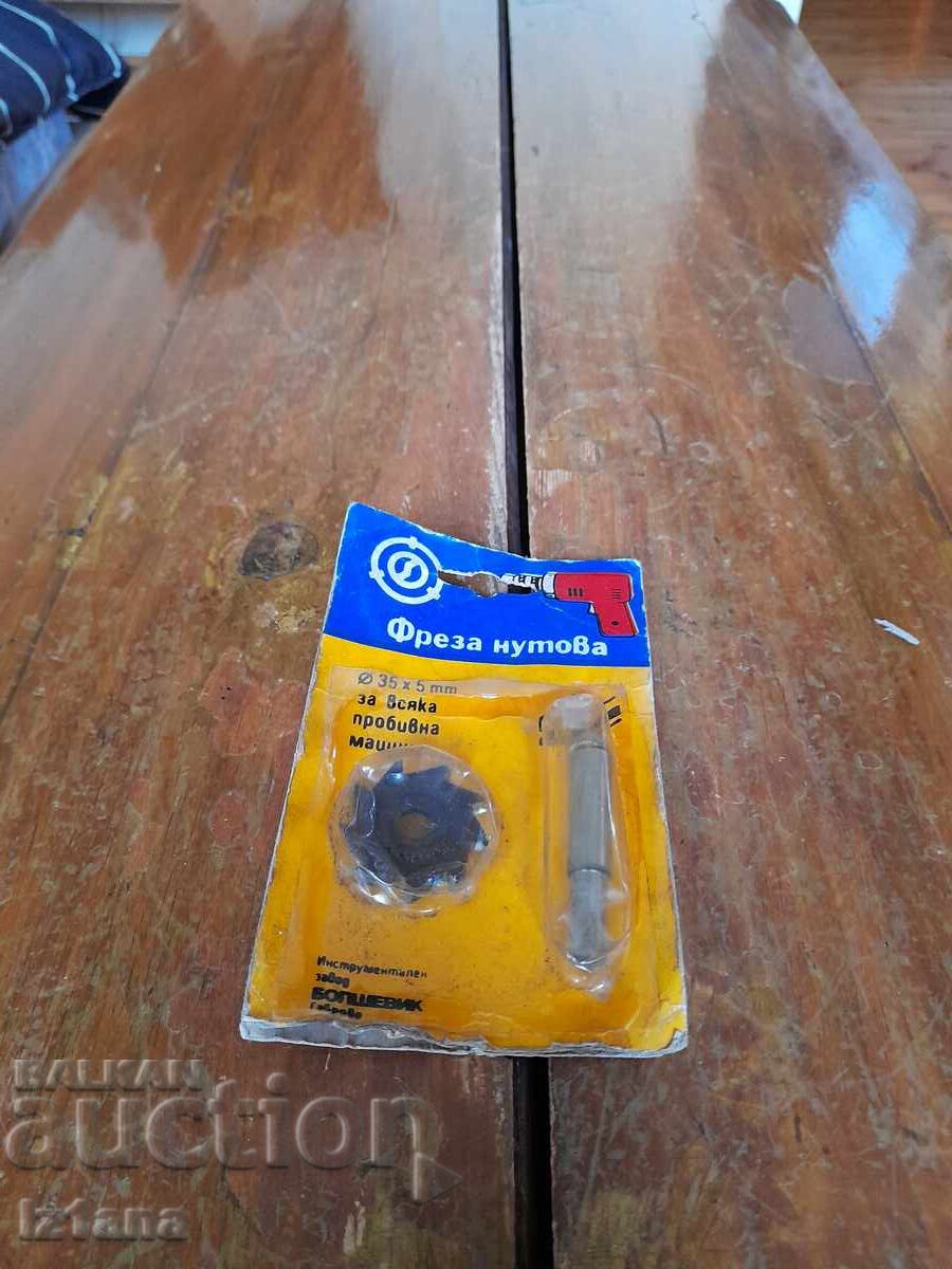 Old drill bit for slotting