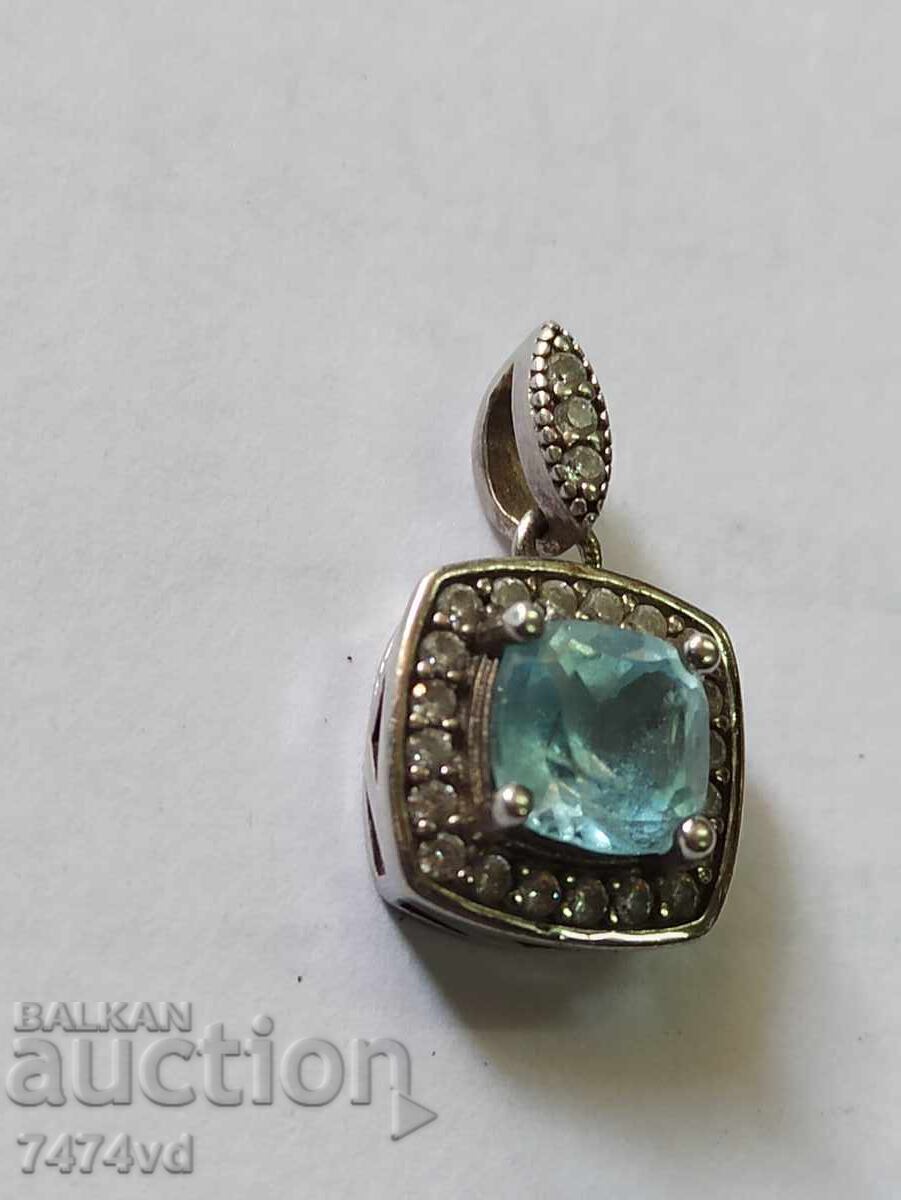 MEDALION DE ARGINT CU TOPAZ ALBASTRU DE ÎNALTĂ CALITATE cu preț 100.00 BGN | € 51.13 MEDALION DE ARGINT CU TOPAZ ALBASTRU DE ÎNALTĂ CALITATE cu preț 100.00 BGN | € 51.13