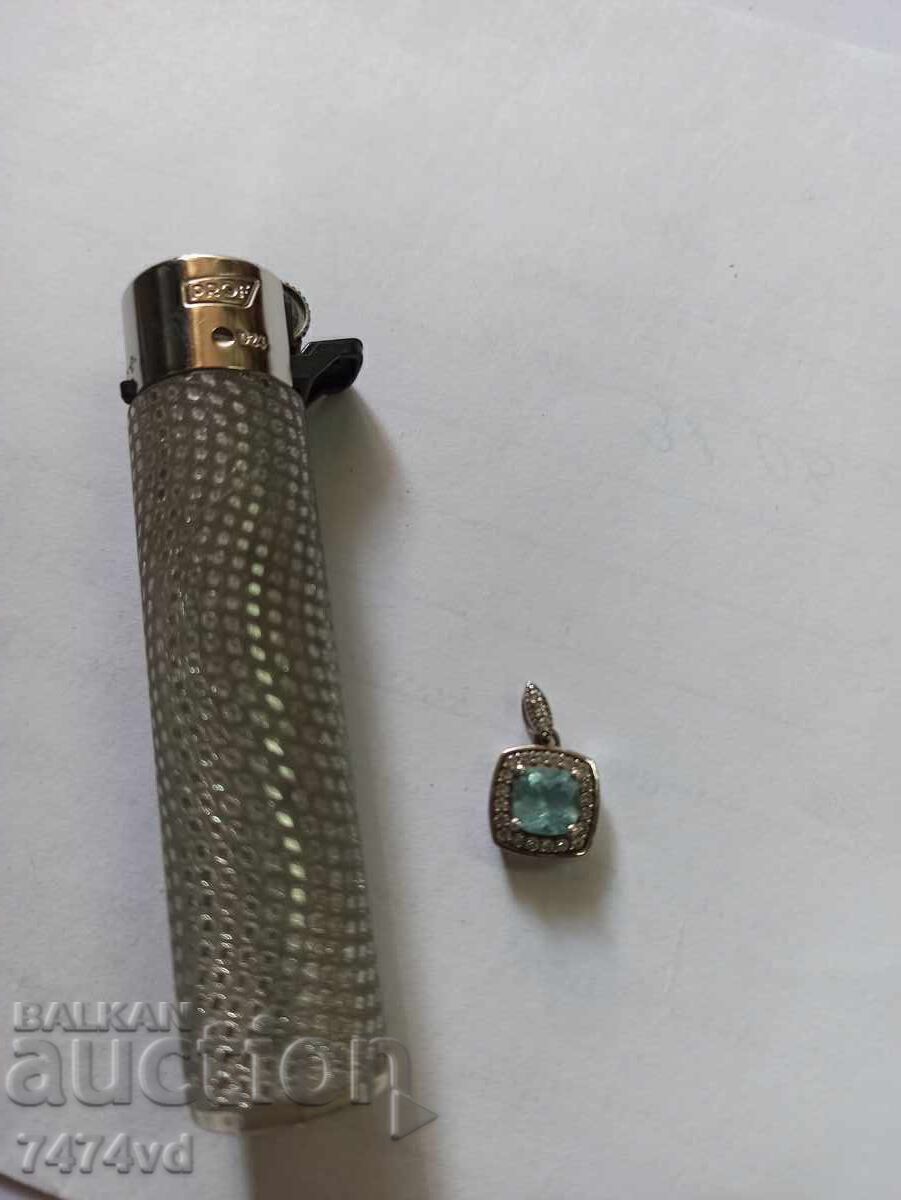 Livrarea MEDALION DE ARGINT CU TOPAZ ALBASTRU DE ÎNALTĂ CALITATE Livrarea MEDALION DE ARGINT CU TOPAZ ALBASTRU DE ÎNALTĂ CALITATE