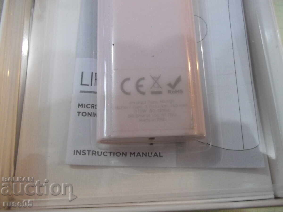 Delivery of "Magnitone Lift-Off Pink" facial care device working Delivery of "Magnitone Lift-Off Pink" facial care device working
