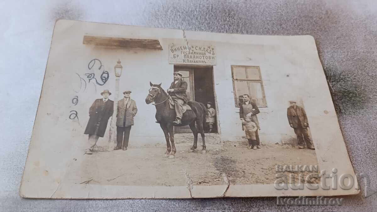 Sisters Ilia and Pavel in front of their own Wine Warehouse and Ms. Sisters Ilia and Pavel in front of their own Wine Warehouse and Ms.