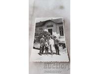 Sofia School Man woman and boys in front of 90th grade of Valcho Ivanov School