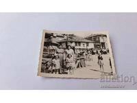 Photo Martinovo Two women and children in the square 1956