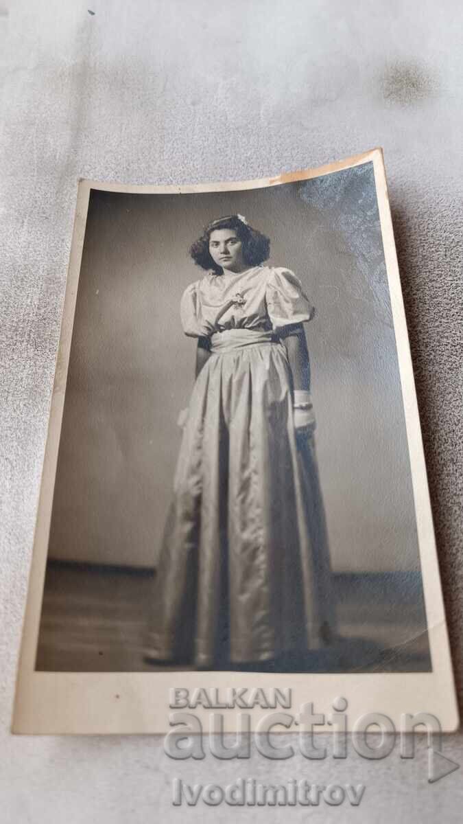 Photo Young girl in formal dress