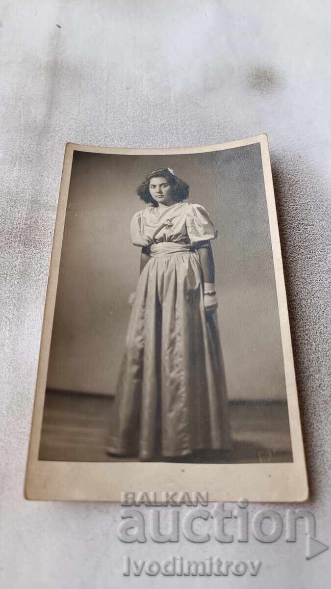 Photo Young girl in formal dress Photo Young girl in formal dress