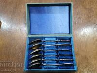 set of old silver spoons