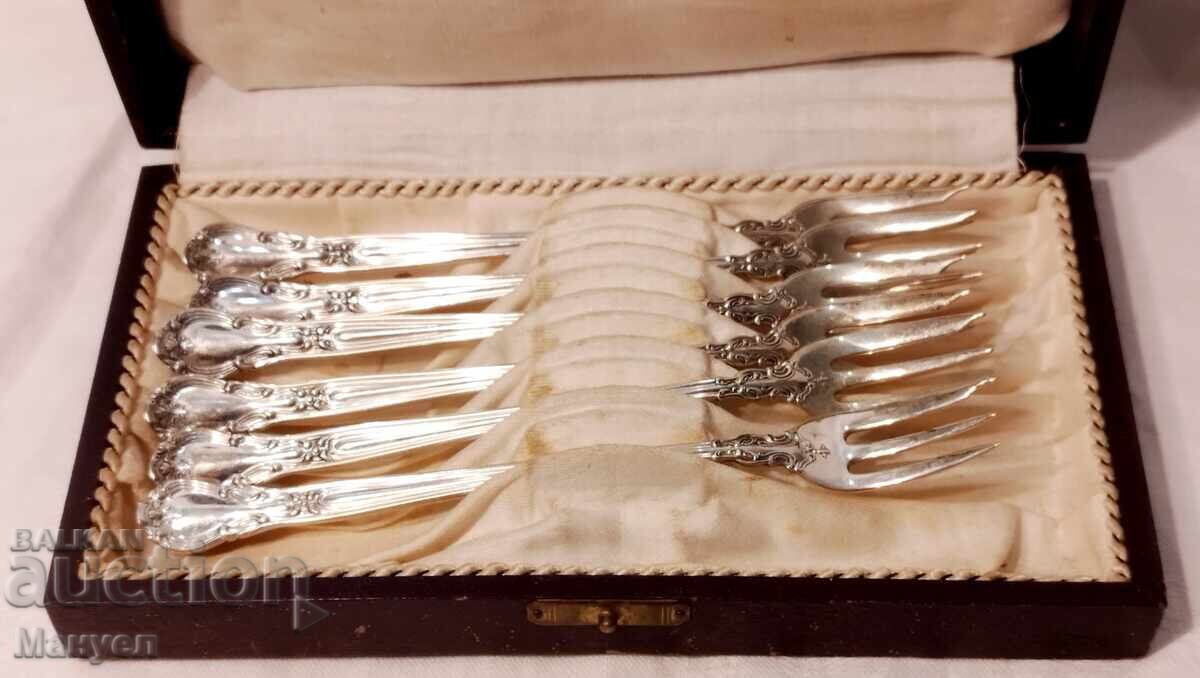 I am selling a set of old silver oyster cutlery. I am selling a set of old silver oyster cutlery.