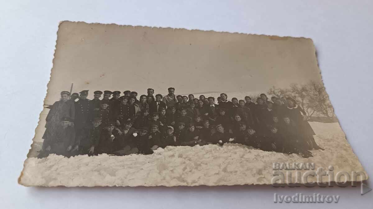 Photo 3rd grade students with their teacher in winter Photo 3rd grade students with their teacher in winter