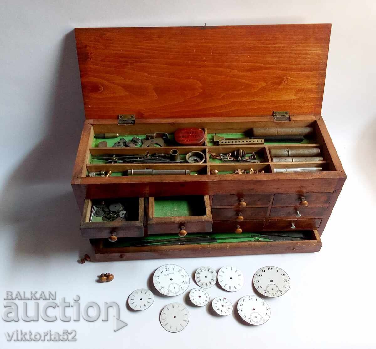 Old watchmaker's box with tools and parts Old watchmaker's box with tools and parts