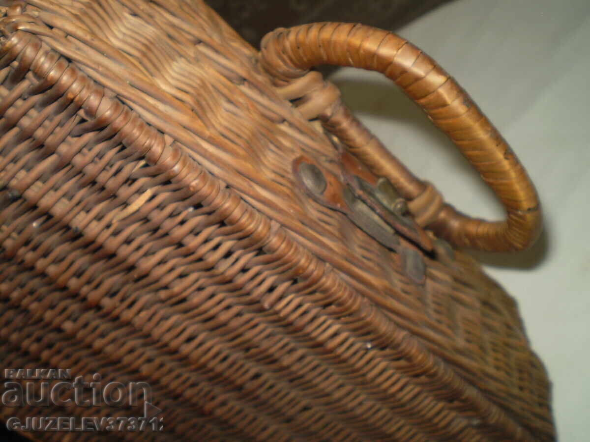 Delivery of Old small decorative suitcase Retro wicker picnic basket Delivery of Old small decorative suitcase Retro wicker picnic basket