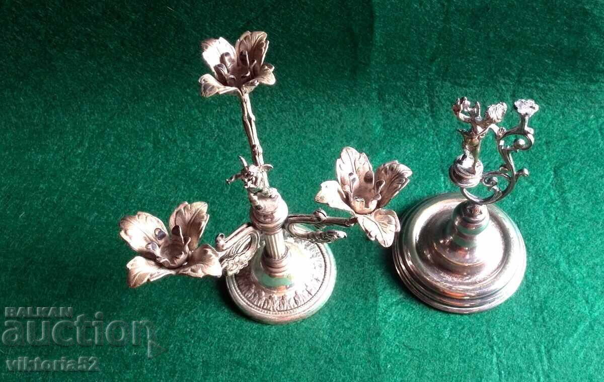 Miniature old silver-plated candlesticks with a cherub-angel with price 175.00 BGN | € 89.48 Miniature old silver-plated candlesticks with a cherub-angel with price 175.00 BGN | € 89.48
