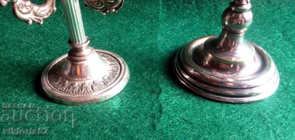 Auction Miniature old silver-plated candlesticks with a cherub-angel Auction Miniature old silver-plated candlesticks with a cherub-angel