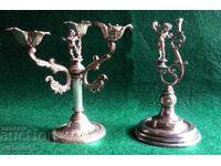 Miniature old silver-plated candlesticks with a cherub-angel