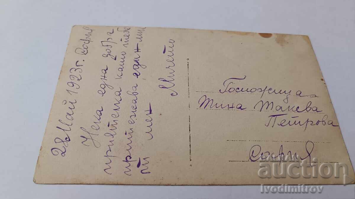 Auction  Photo Young girl sewing the flag of SK Rakovski village of Maslovo 1932