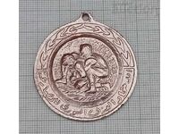 WRESTLING OLYMPICS MEDAL
