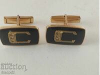 Old cufflinks, letter C buttonholes with zircons