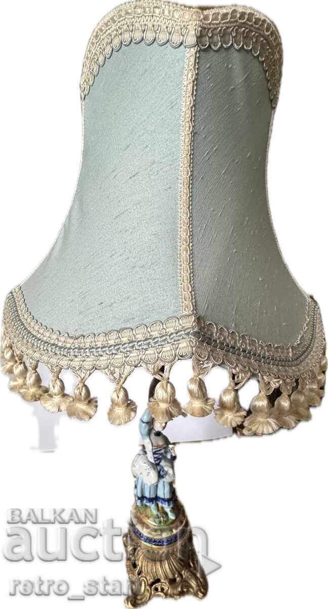 Delivery of Night lamp, vintage porcelain figure Delivery of Night lamp, vintage porcelain figure