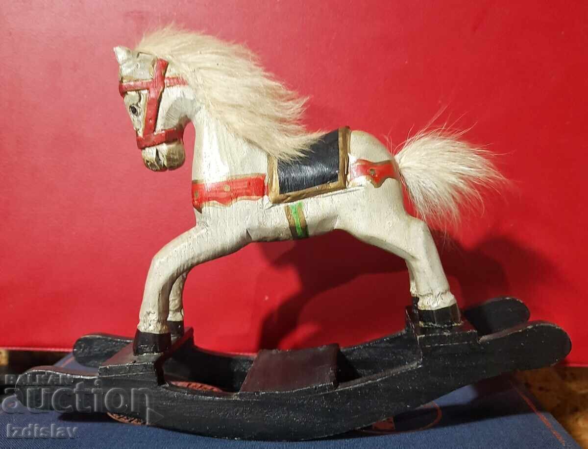 Auction  Old rocking wooden horse