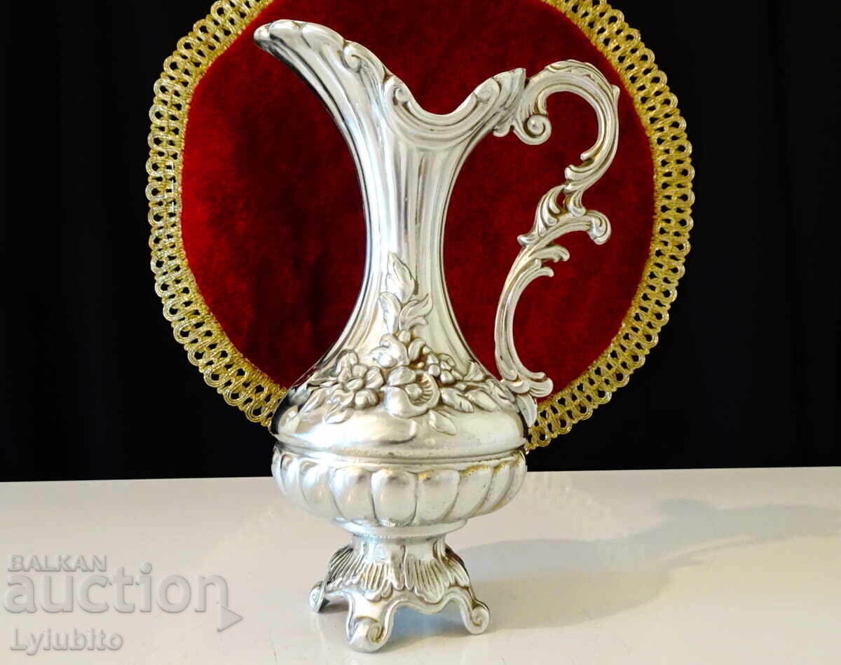 Delivery of Italian embossed pewter jug, Baroque Delivery of Italian embossed pewter jug, Baroque