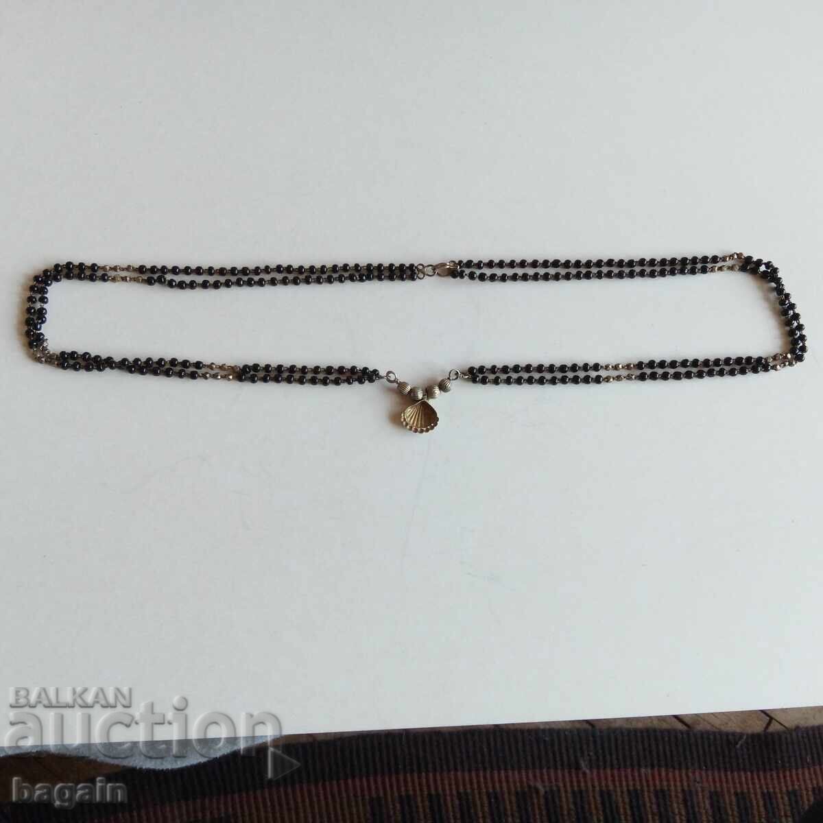 A unique necklace. - 5