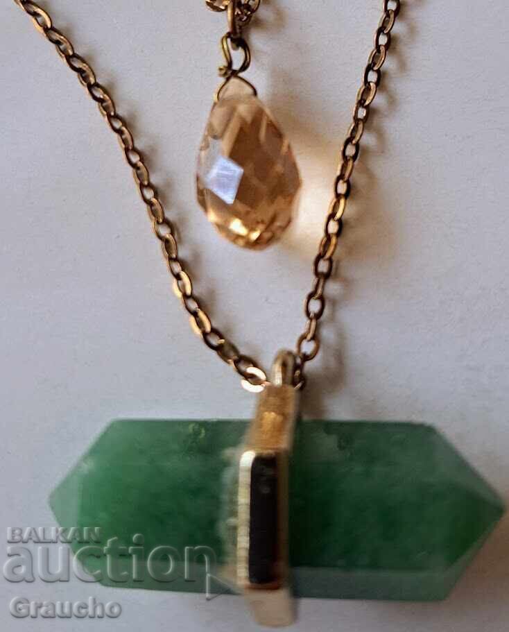 Two pendants with semi-precious stones Two pendants with semi-precious stones