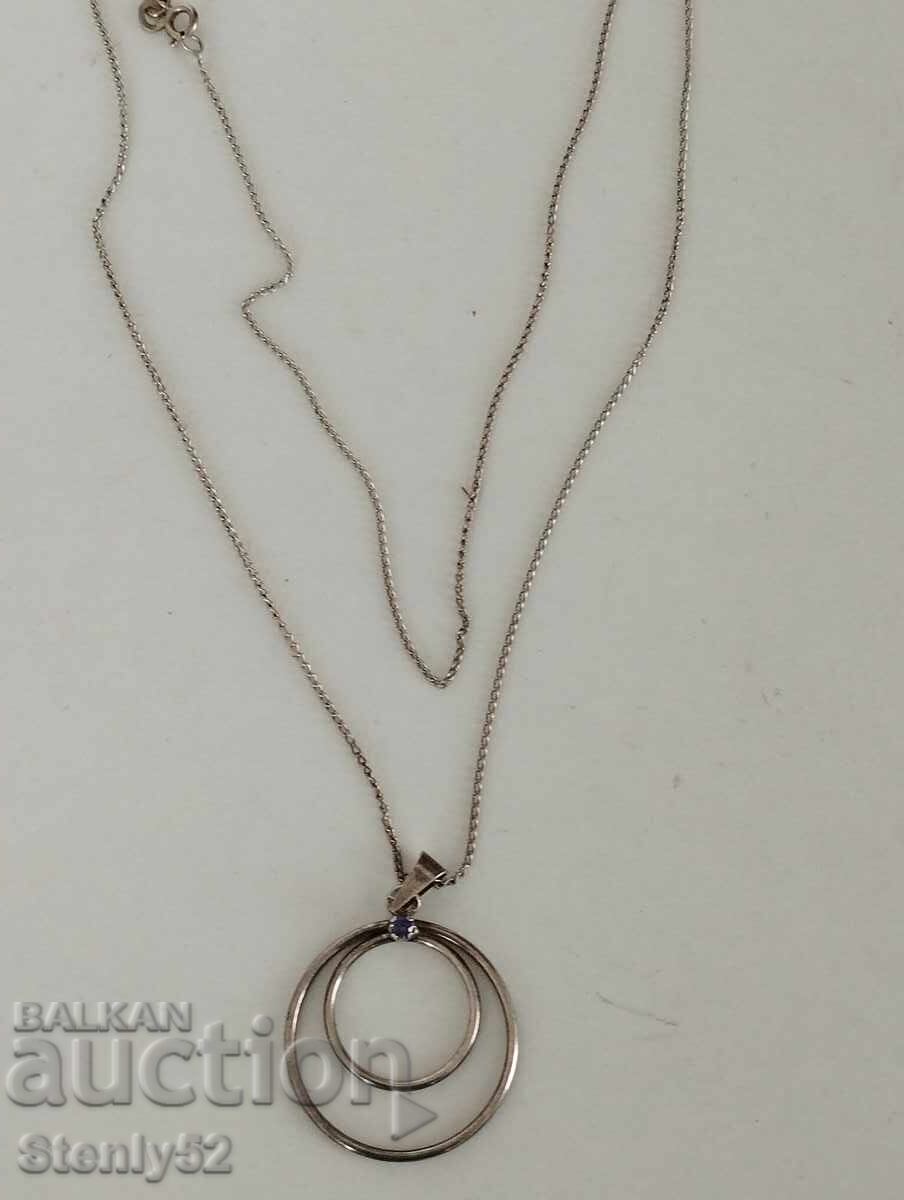 Auction  Silver pendant with chain with a small natural stone