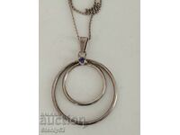 Silver pendant with chain with a small natural stone