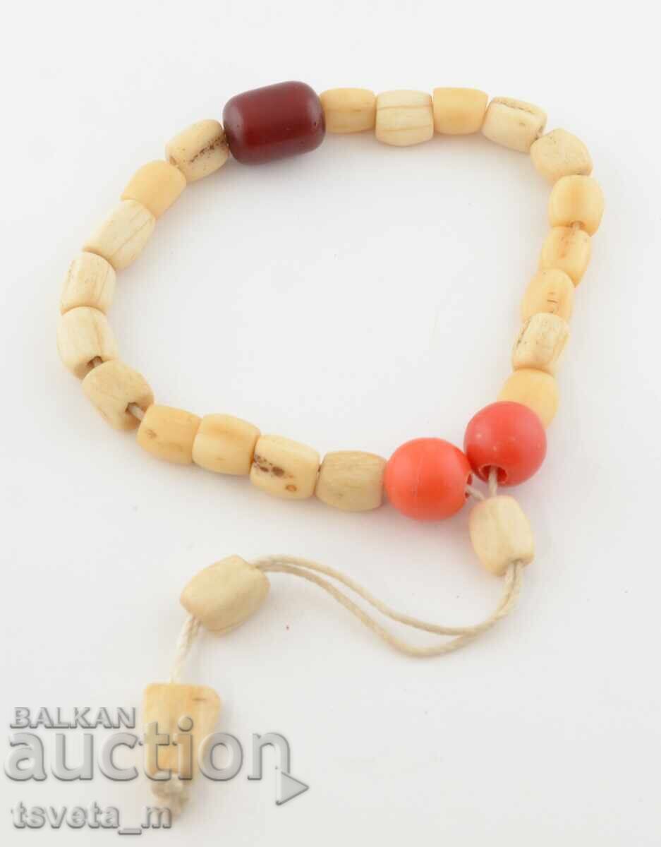 Auction  Bone rosary with faturan beads