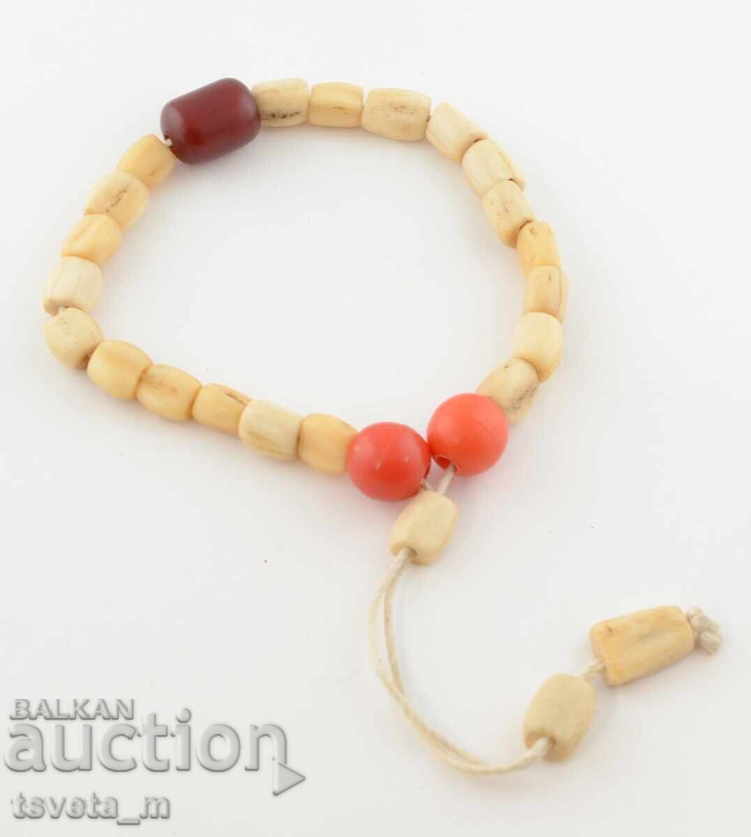 Bone rosary with faturan beads