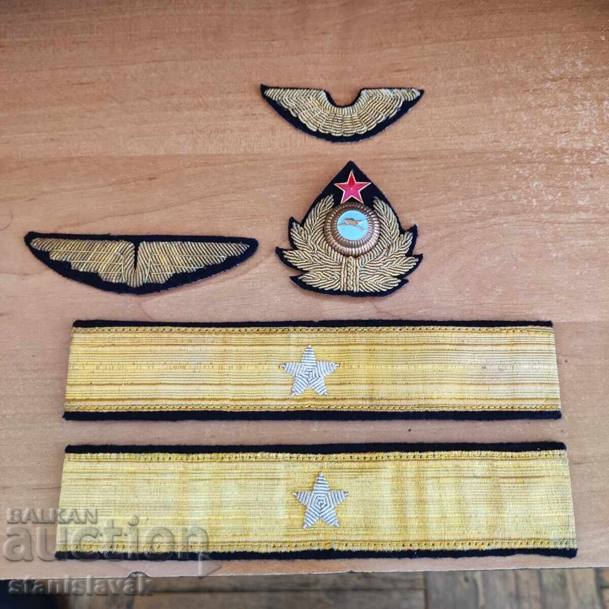 Set of cockades, badges and braids of the BGA "Balkan" Set of cockades, badges and braids of the BGA "Balkan"