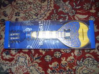 retro bottle in the shape of a bouzouki