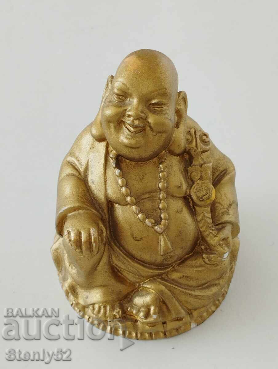 Plaster figure of the Buddha of Wealth.