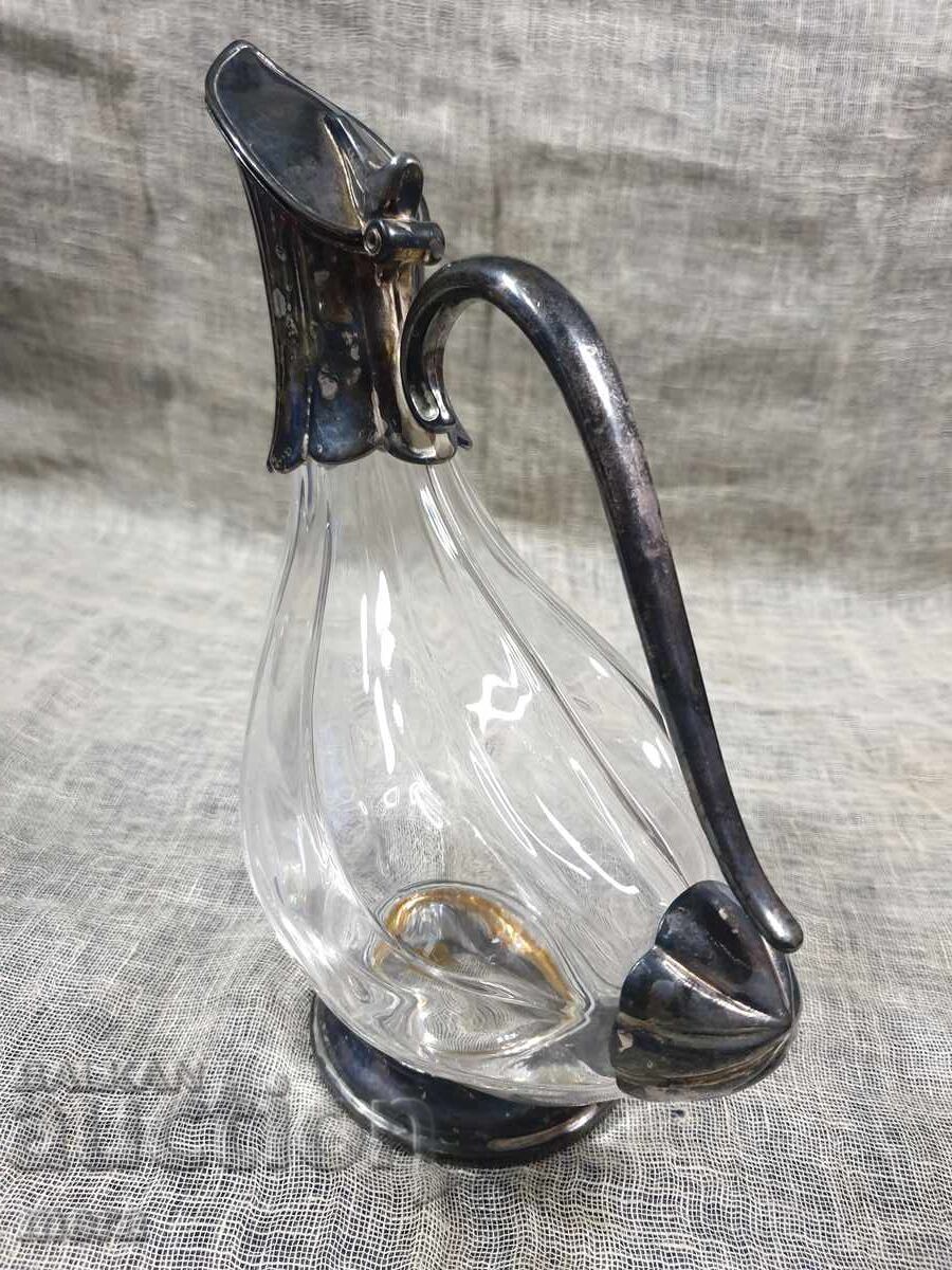Crystal decanter with silver-plated duck-shaped fittings RCR with price 160.00 BGN | € 81.81 Crystal decanter with silver-plated duck-shaped fittings RCR with price 160.00 BGN | € 81.81
