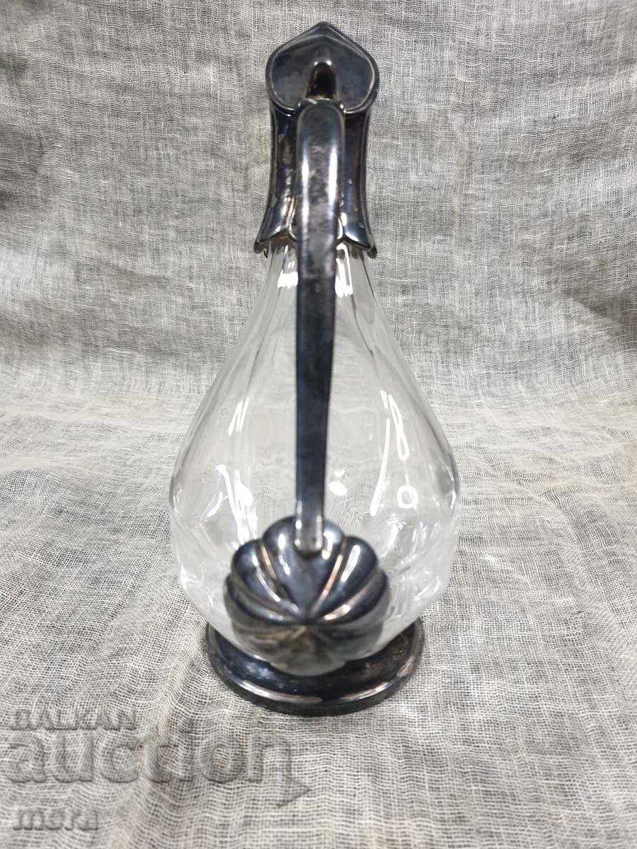 Crystal decanter with silver-plated duck-shaped fittings RCR - 6 Crystal decanter with silver-plated duck-shaped fittings RCR - 6