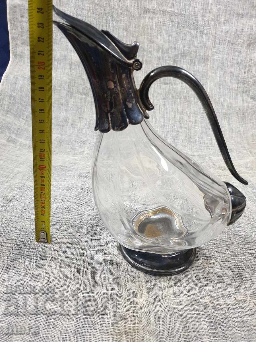 Crystal decanter with silver-plated duck-shaped fittings RCR - 7 Crystal decanter with silver-plated duck-shaped fittings RCR - 7