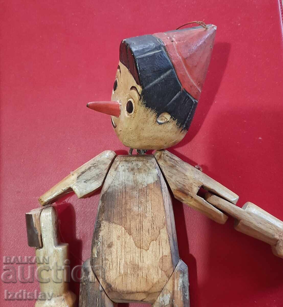 Delivery of Collectible Old Wooden Pinocchio Doll Delivery of Collectible Old Wooden Pinocchio Doll
