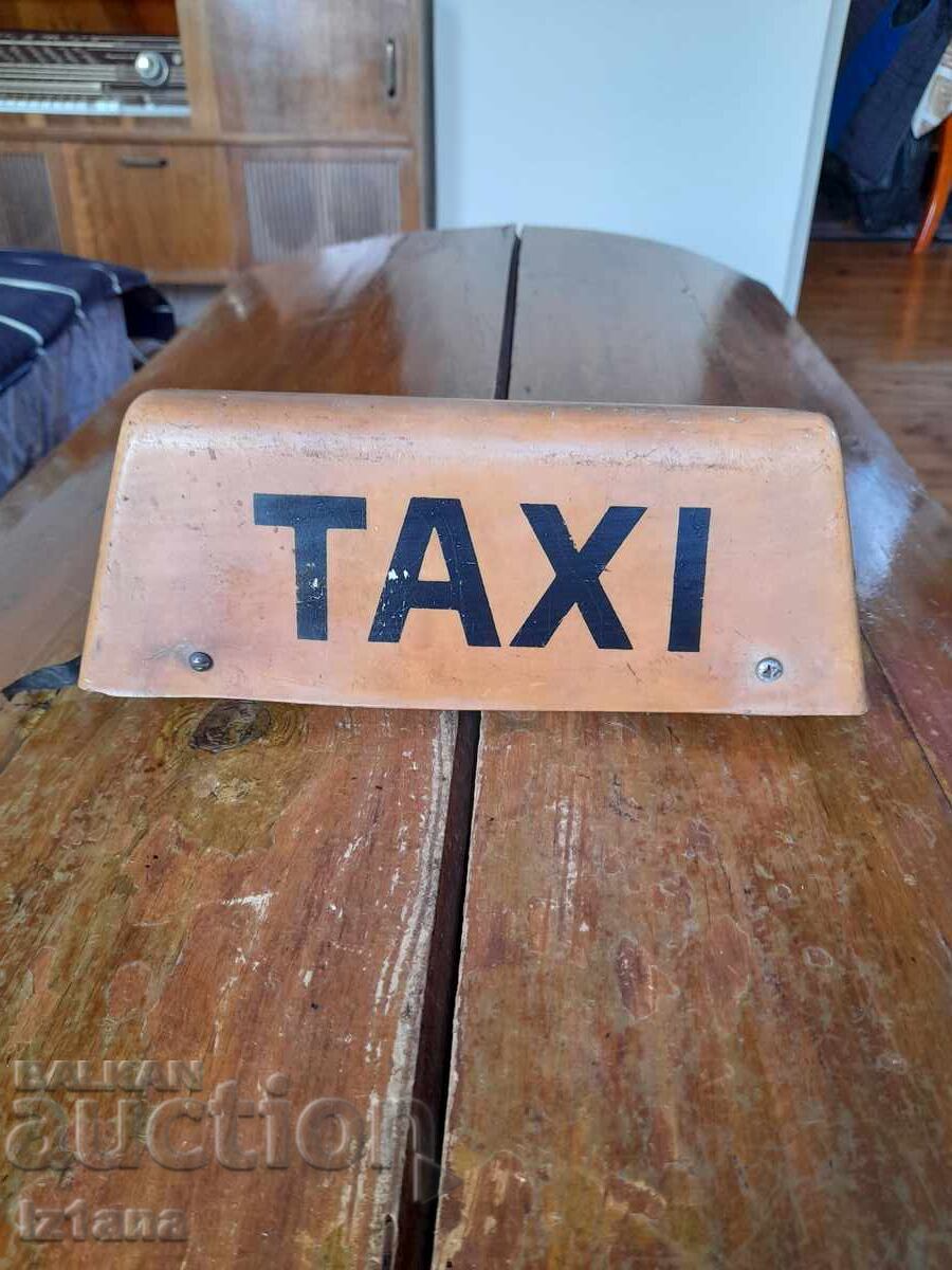 Old TAXI sign