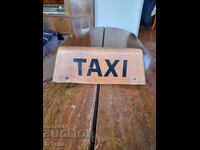 Old TAXI sign