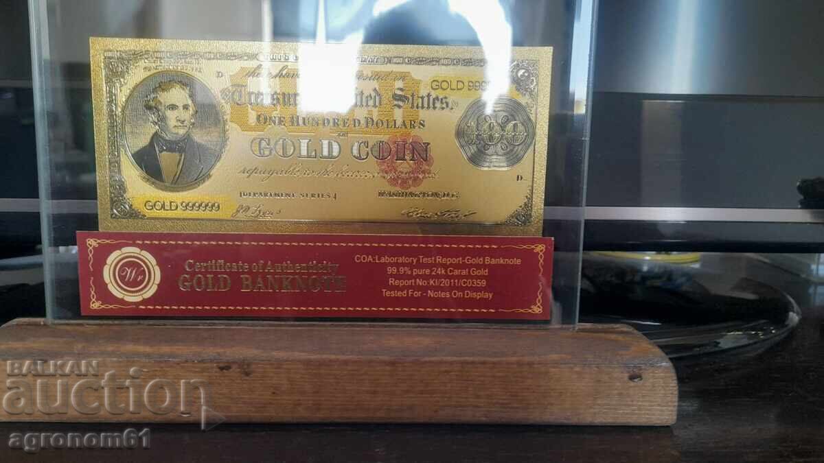 Souvenir gold banknotes 100 dollars 1882 in a stand