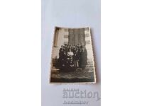 Photo Varna Schoolgirls with their teacher in front of a monument