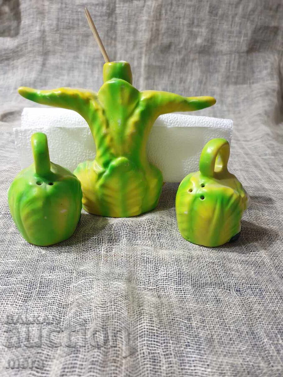 Delivery of Porcelain salt and pepper shakers and napkin holder with a cheerful children's motif