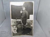 AT THE BORDER, A BORDER GUARD STANDS AROUND 1920